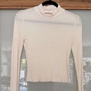The Row Cream Turtleneck Top